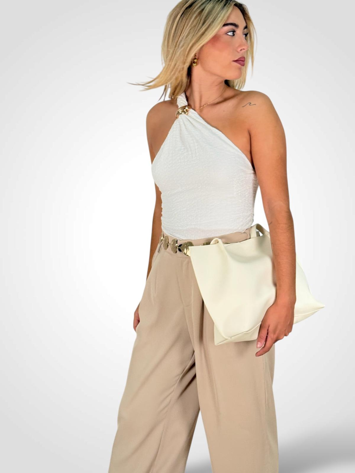 BLUSA ASIMETRICA TROQUELADA