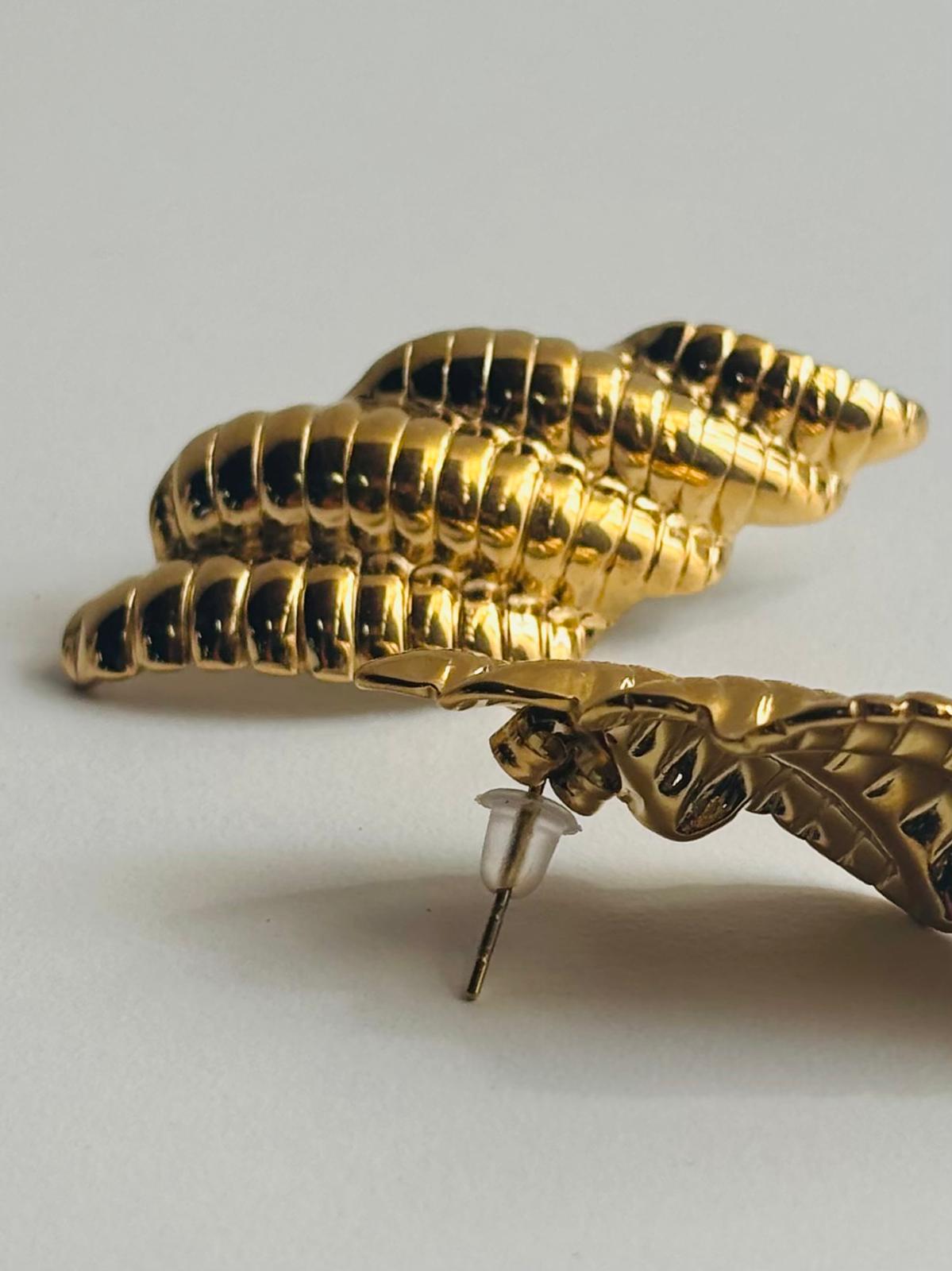 Pendientes de acero dorado - detalle